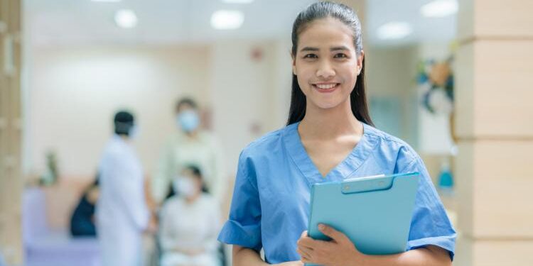 Asian female nurse in uniform working in hospital
